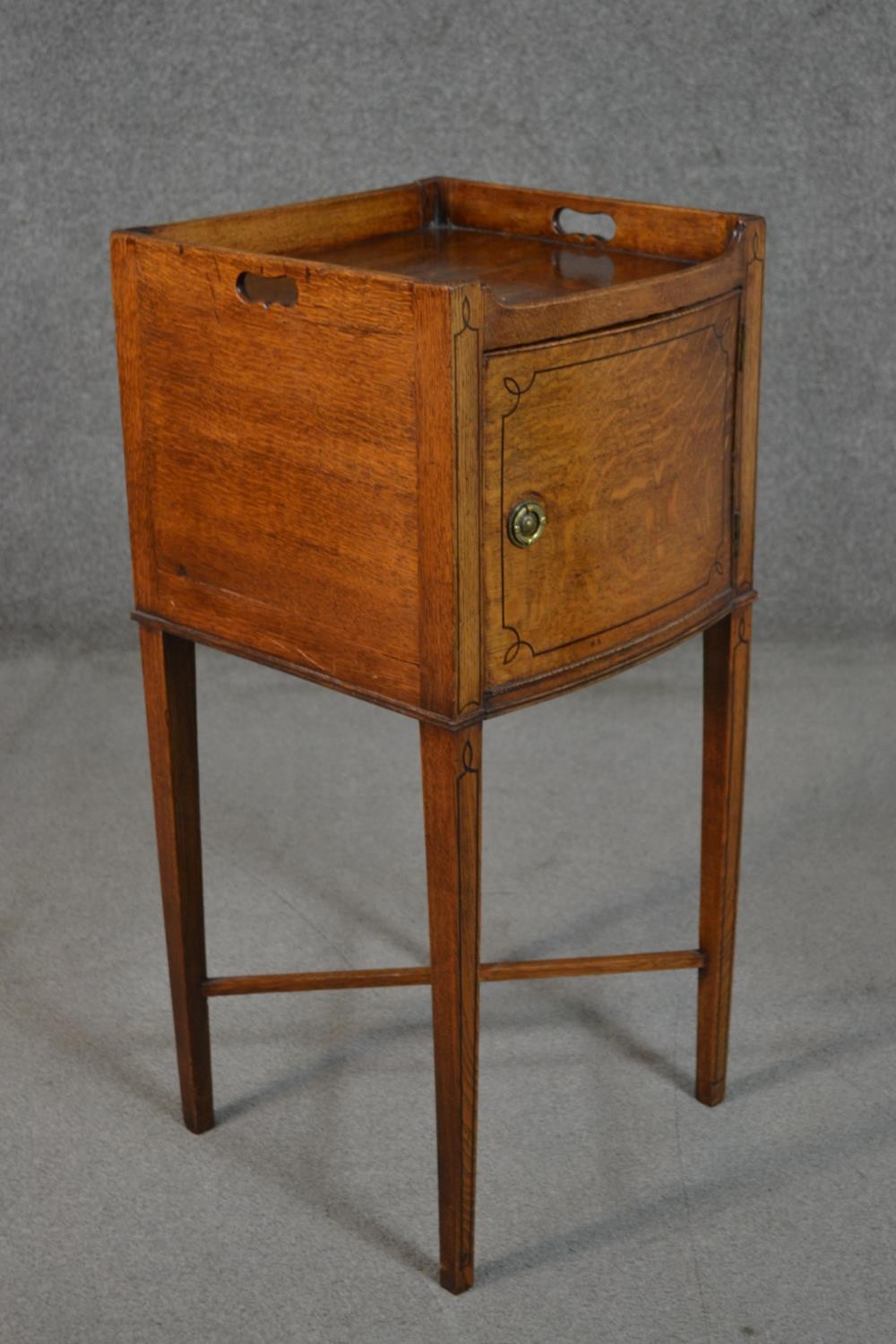 A George III style oak and inlaid bedside cabinet, the gallery top with handles, over a cupboard - Image 4 of 7