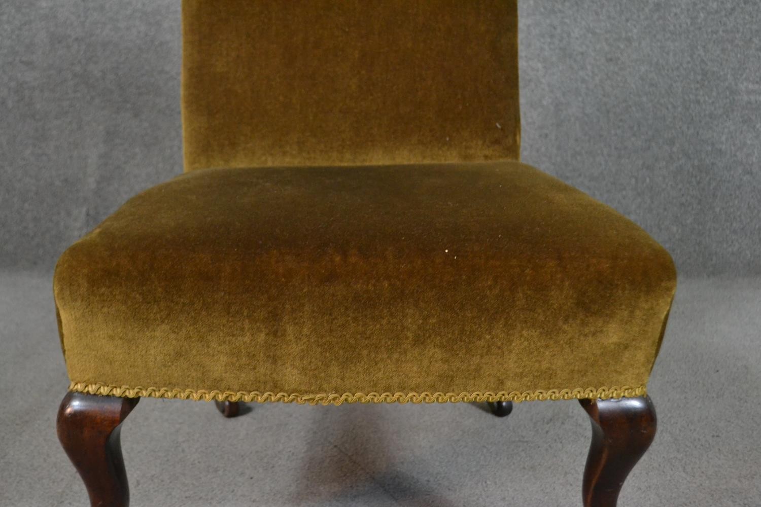 A late Victorian nursing chair, upholstered in golden velour, on mahogany cabriole legs. - Image 4 of 5