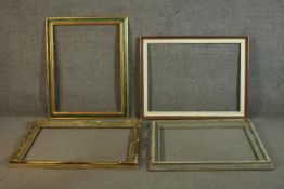 A collection of four large picture frames, including one carved giltwood and gesso frame with