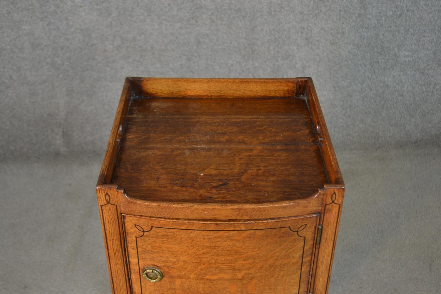 A George III style oak and inlaid bedside cabinet, the gallery top with handles, over a cupboard - Image 3 of 7