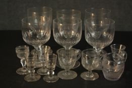 A collection of thirteen 18th and 19th century drinking glasses, various hand cut designs and sizes.