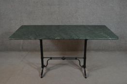 A French or Italian marble topped cast iron table, with a rectangular green marble top, on cast