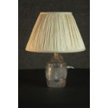 A 19th century cut glass decanter, converted to a table lamp, with a diamond cut body and a