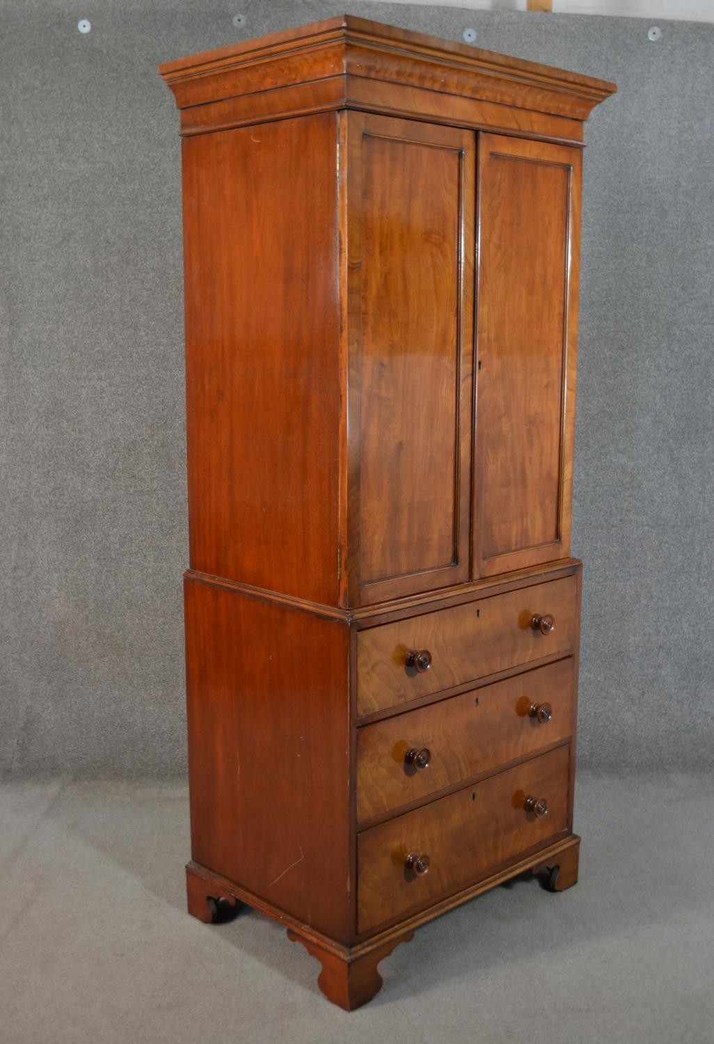 An early 19th century mahogany linen press, of narrow proportions, with two cupboard doors, - Image 7 of 7