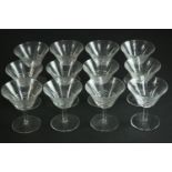 A set of twelve hand cut crystal martini glasses. H.11 Dia.10cm.