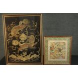 Two framed and glazed 19th century silk embroideries. One with gold thread on a black ground