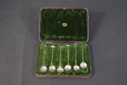 A set of six 19th century Japanese silver spoons with animal crests (swallow missing), in