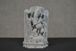 A Indian carved soapstone Ganesha standing on a rat. H.32 W.19 D.10.5cm