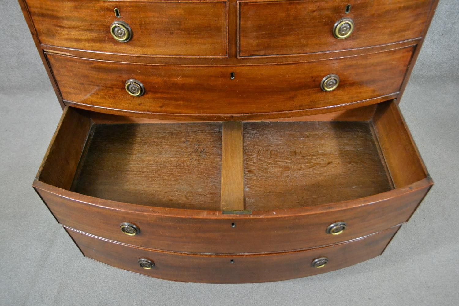 A George III mahogany bow front chest, of two short over three long graduated drawers, above a - Image 6 of 6
