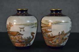 A pair of Japanese porcelain vases, the reserves painted with a boat and a harbour, on a cobalt blue