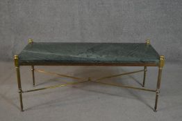 A mid to late 20th century coffee table, with a rectangular green marble top, on a brass frame