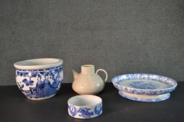 A collection of mixed porcelain, including a Chinese blue and white planter, a blue and white