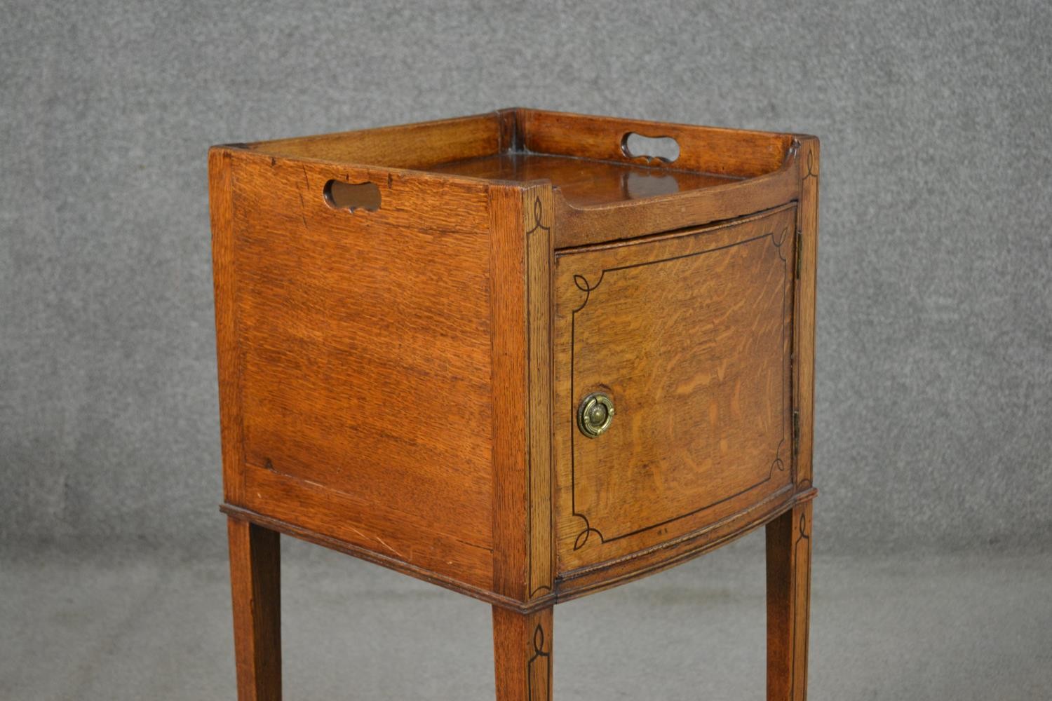 A George III style oak and inlaid bedside cabinet, the gallery top with handles, over a cupboard - Image 5 of 7