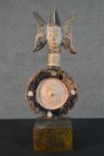 An early 20th century painted African tribal divination carving with figural finial. Mounted on a