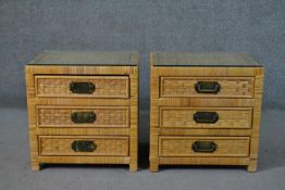 A pair of 20th century rattan bedside chests, with a plate glass top, over three long drawers with