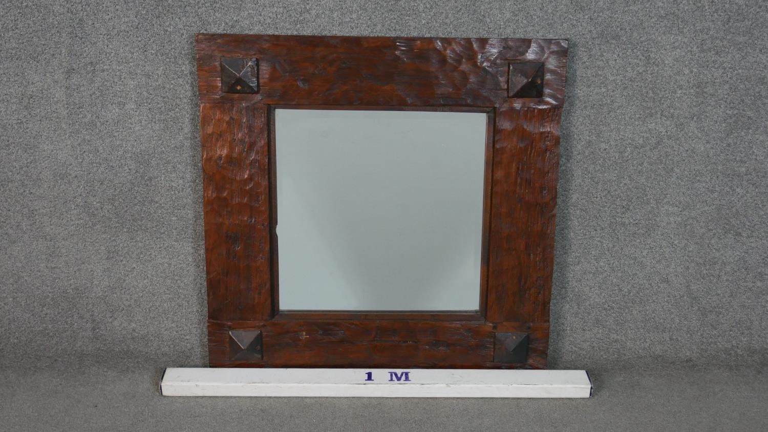 An Eastern teak square wall mirror, with a bevelled mirror plate in a rustic frame. H.80 W.80cm - Image 2 of 4