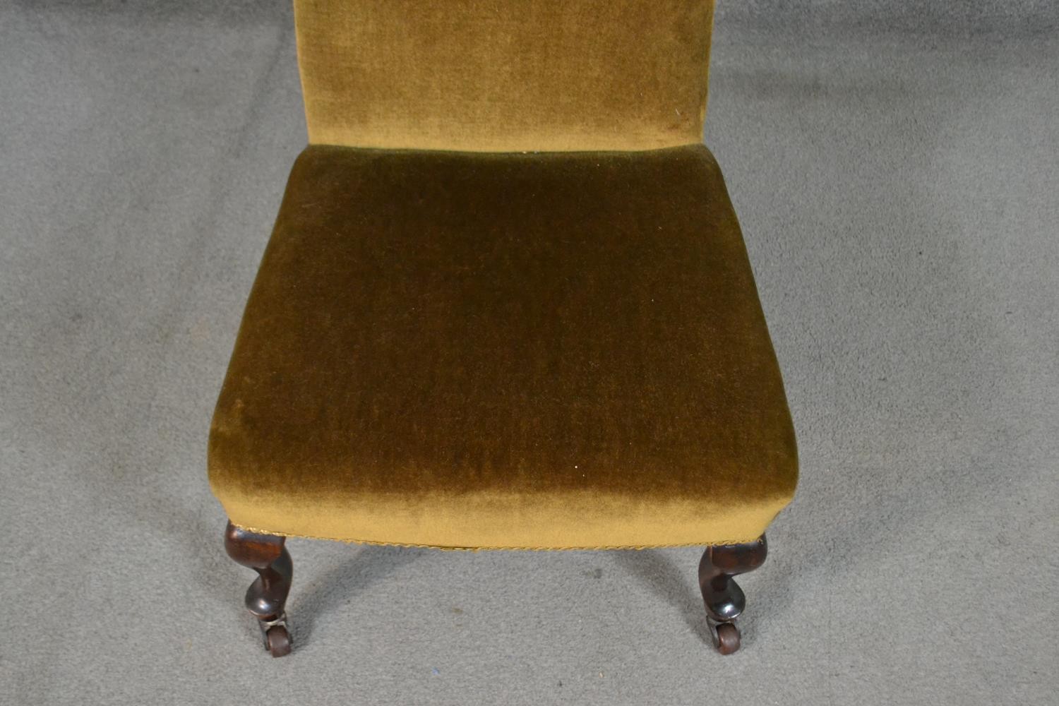 A late Victorian nursing chair, upholstered in golden velour, on mahogany cabriole legs. - Image 3 of 5