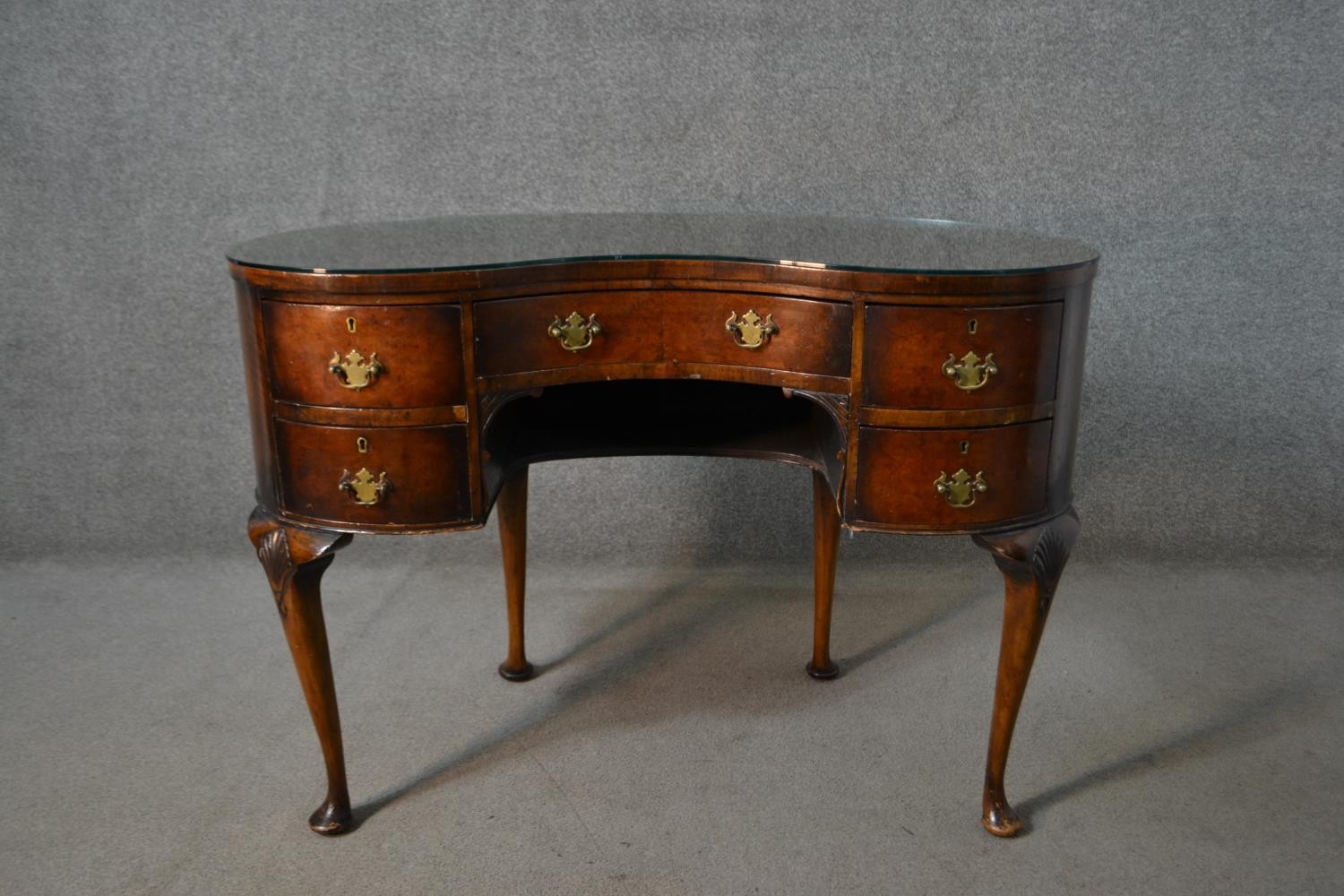 An early 20th century walnut kidney shaped dressing table, with a crossbanded top over an - Image 2 of 11