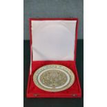 A boxed Indian hand painted and gilded white marble dish, decorated with birds, fish and flowers.