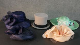 A collection of five vintage hats, including a Wegener grey top hat with black silk ribbon and