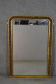 A Victorian gilt pier mirror, of rectangular form with rounded top corners, the frame with a