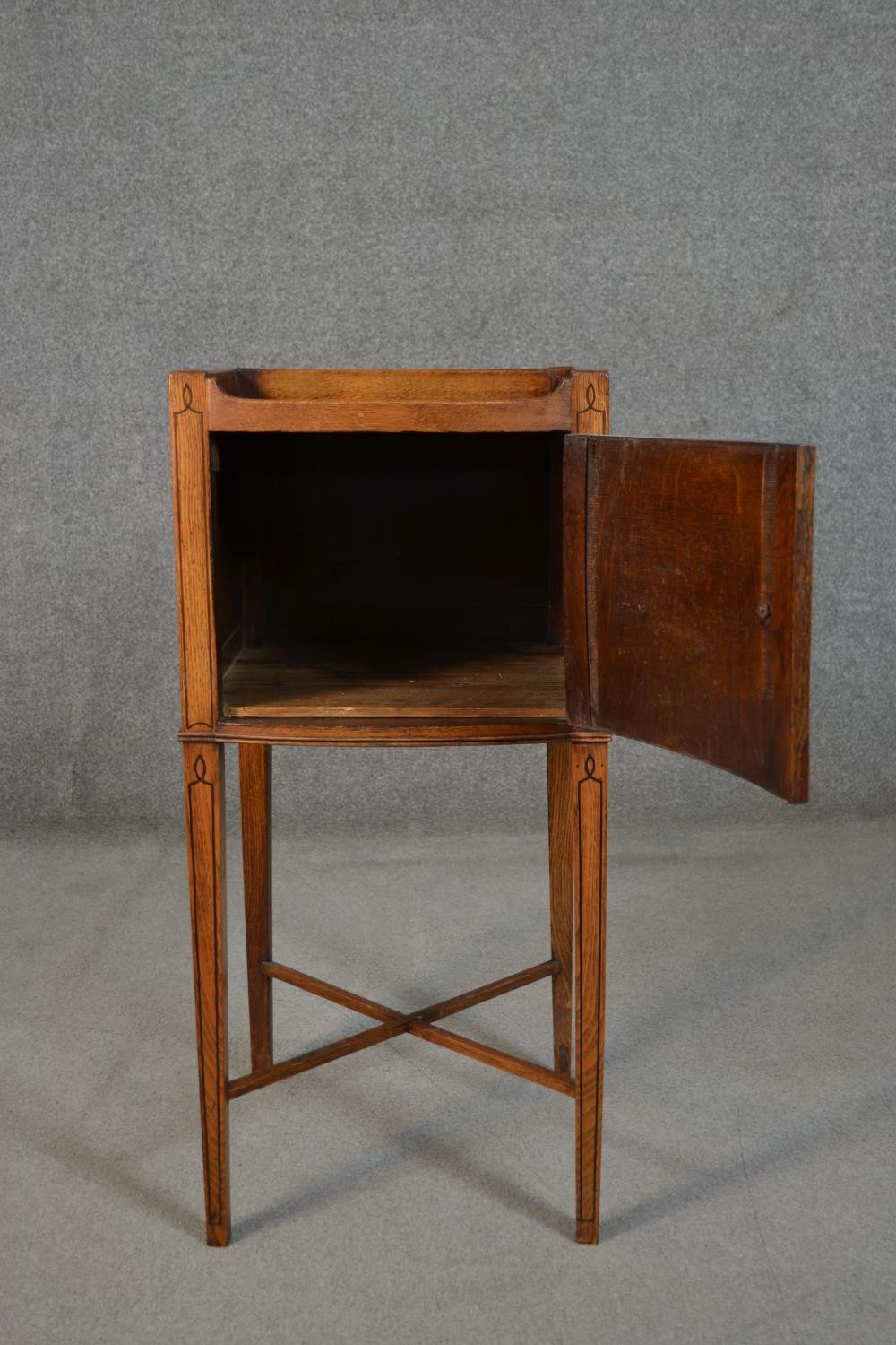 A George III style oak and inlaid bedside cabinet, the gallery top with handles, over a cupboard - Image 2 of 7