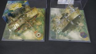 A Corgi perspex cased set, B17-Sally B, Mustang and Thunderbolt along with a Corgi perspex cased