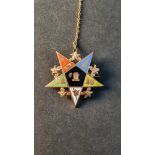 A 9ct yellow gold and enamel masonic order of the Eastern Star brooch with yellow metal safety