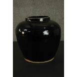 A large Chinese black ware ceramic jar. H.25cm.