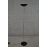 A brushed black metal uplighter floor lamp with adjustable head. H.176cm