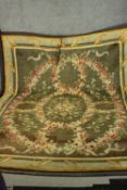 A large Old handmade Abusson motif carpet. L.340 W.246cm.