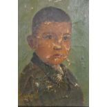 A framed early 20th century oil on canvas of a young boy, indistinctly signed and dated 1924