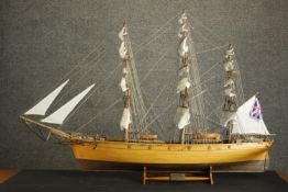 A scratch built model of the Cutty Sark tea clipper, on stand. H.78 W.120 D.19cm.