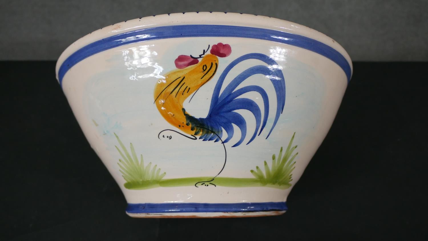 A large Portuguese hand painted ceramic rooster bowl along with a Majolica floral design bowl. D. - Image 3 of 6