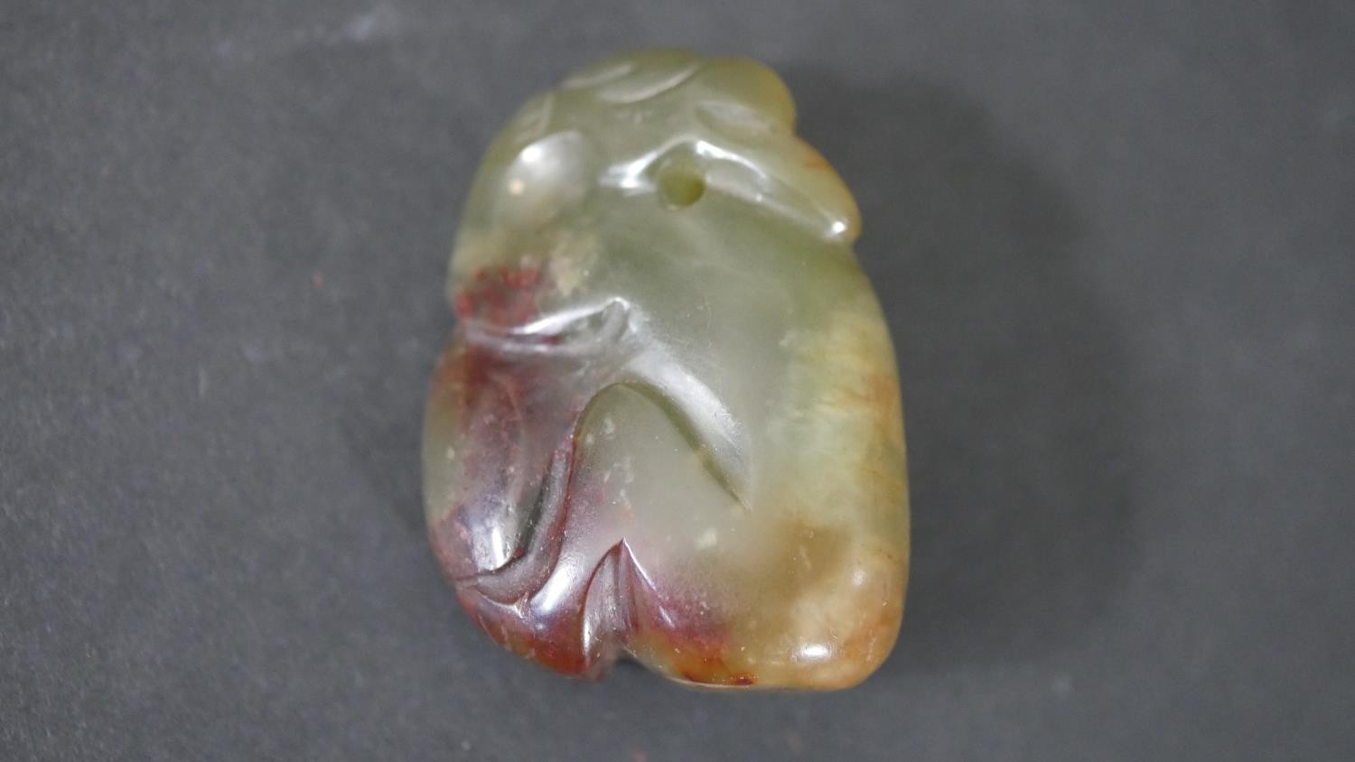 A Chinese carved jade monkey pendant along with a Chinese porcelain fragment and silver plated - Image 4 of 5