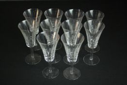 A set of ten hand cut crystal trumpet design wine glasses. H.19 Dia.8cm.