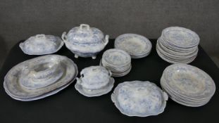 A Wedgwood Asiatic Pheasants pattern part dinner set, with transfer decorated designs in blue,