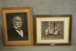 Two framed and glazed early 20th century black and white photos, one family portrait and one of a