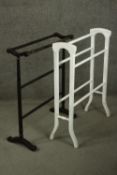 Two early 20th century painted wood towel racks, one painted black, the other painted white. H.90