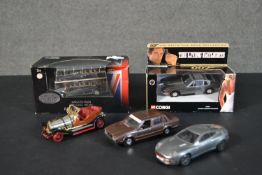 A collection of die cast cars, including a Corgi Chitty Bang Bang car, a boxed Corgi James Bond