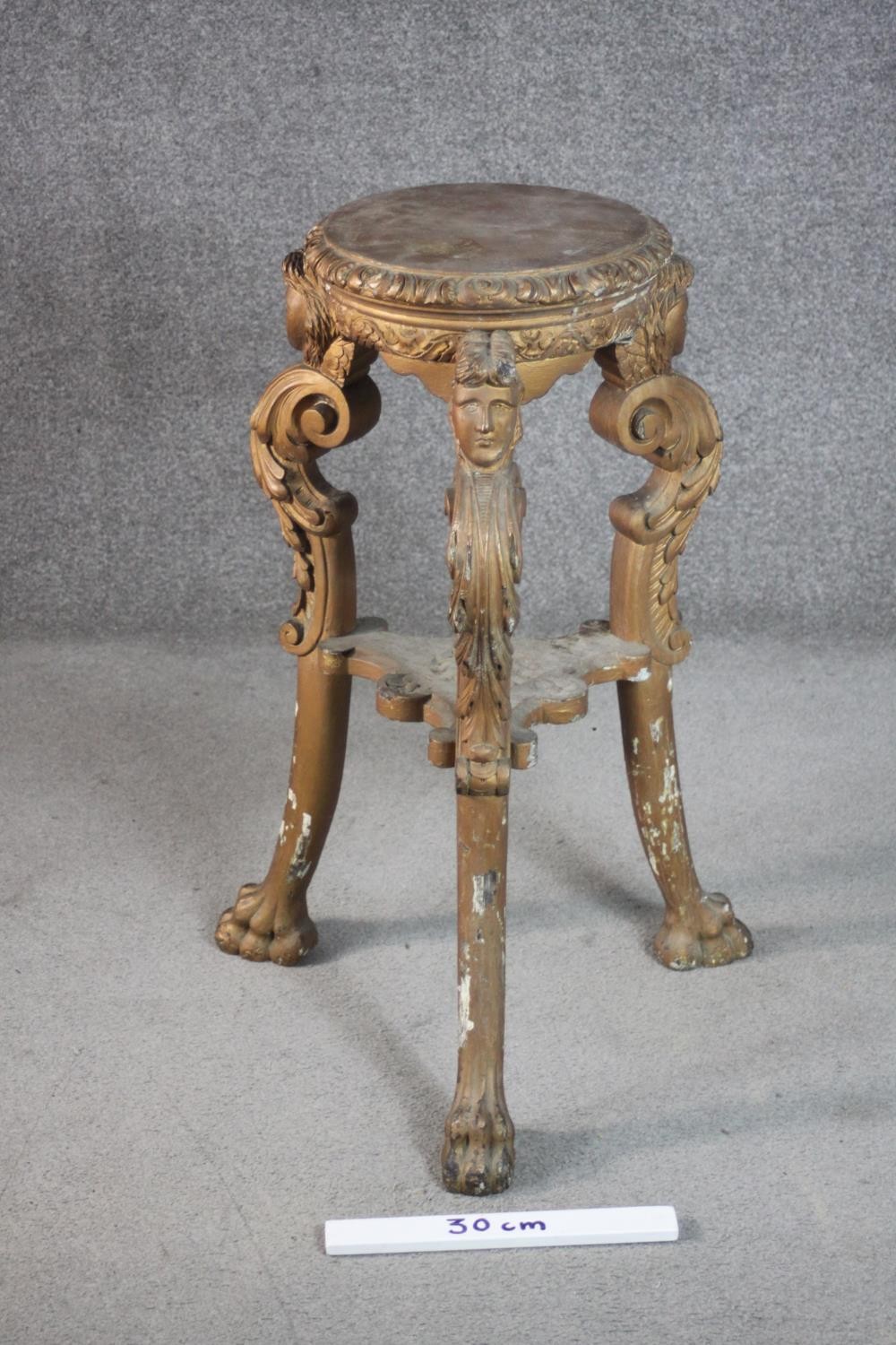 A late 19th century Italian carved wood jardiniere stand, with a circular top, on three ornately - Image 2 of 5
