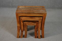 An Indian Sheesham nest of three tables, of rectangular form with splayed legs. H.46 W.46 D.30cm
