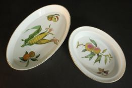 Two oval Royal Worcester Evesham pattern serving dishes. H.5 L.37 W.22cm. (largest)