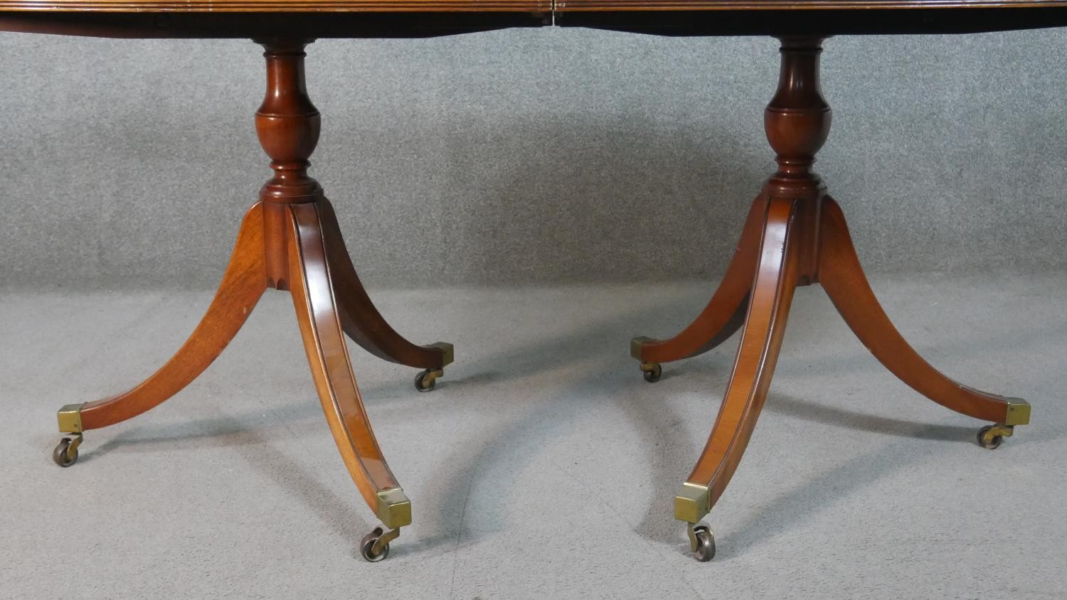 A George III style yew wood D-end dining table, with a cross banded top and additional leaf, on - Image 4 of 9