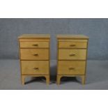 A pair of late 20th century birch veneered plywood bedside chests, probably Scandinavian, with three