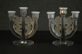 Barolac; a pair of three branch candlesticks, decorated with vines, on hexagonal bases. H.23 W.17cm.