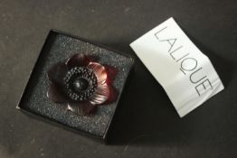 Rene Lalique a rouge glass 'Cache Anemone', designed in 1935, with original box. H.6 D.9 D.8cm.