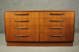 Victor Wilkins for G-Plan, a circa 1970s teak Fresco chest of two banks of four drawers, on a plinth