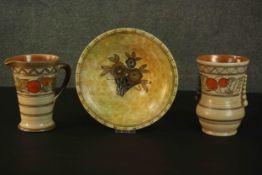 Charlotte Rhead for Crown Ducal, an 'Orange Tree' pottery vase and jug, together with a bowl.