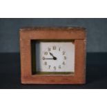 A 19th century French brass carriage clock with leather travel case. White enamel dial with black